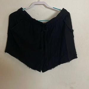 Umgee Black shorts with fringe edges on the bottom elastic waist band